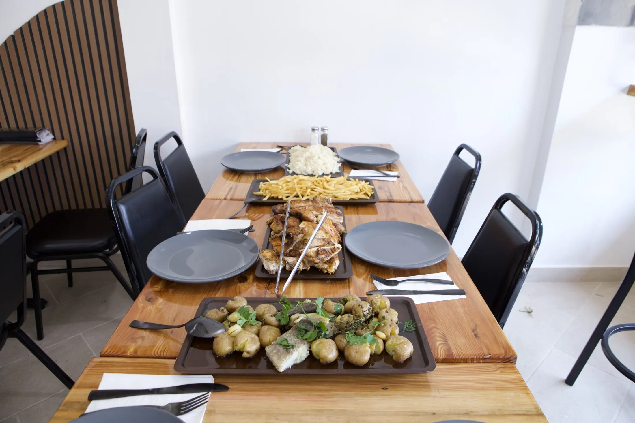 Family-style BBQ table spread